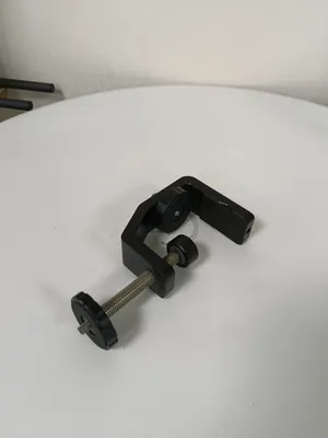 C1 Bench Clamp in black, three-quarter view with the screw extended